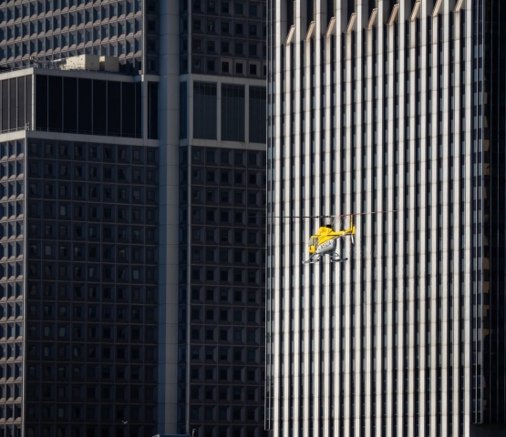 Helicopter Along Side of NYC Building