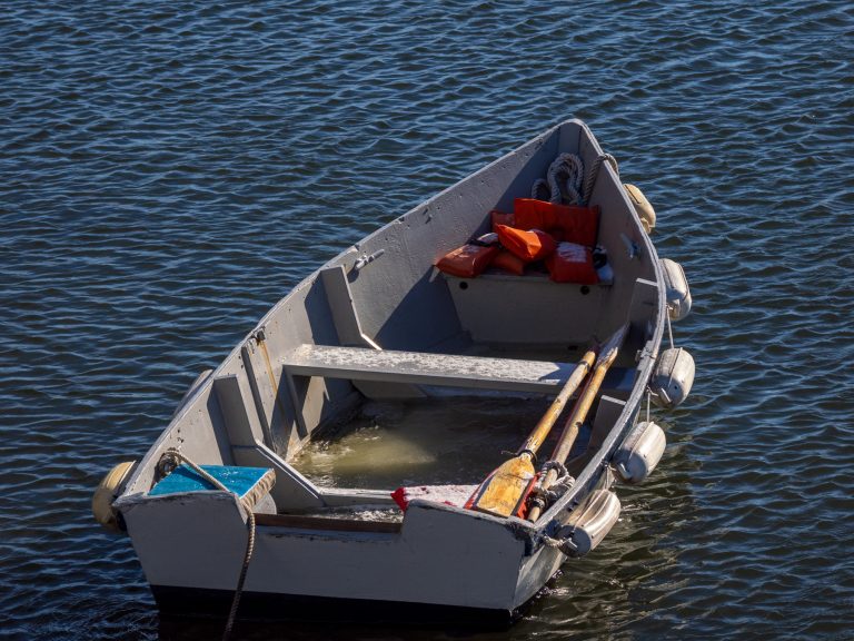 Row Boat in the water near the Ferry from City Island