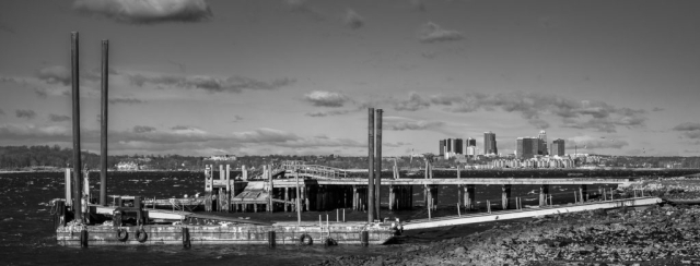 A black and white view of one of the piers on Hart Island