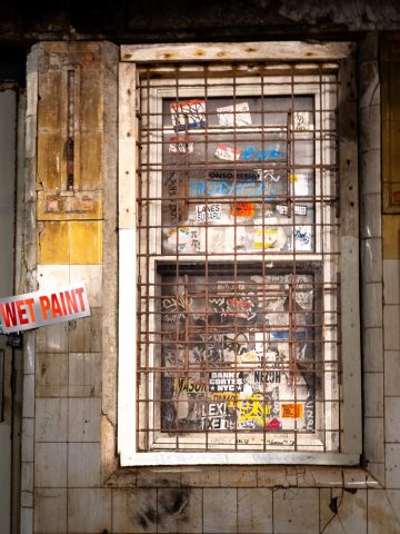 ABANDONED SIGNAGE AT A SUBWAY STATION - Photographer: Bonnie Forman-Franco
